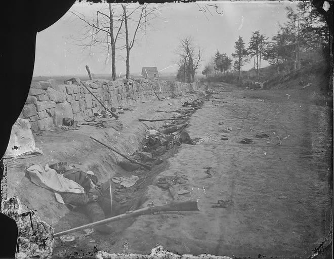 Confederate dead behind a stone wall after the Second Battle of Fredericksburg in Virginia in May 1863.