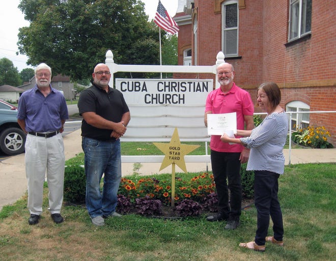 Pictured from the left are: Dan Moore, Pastor Mike Arnett, Carey Bordner and Cathy Churchill. [Courtesy Photo]
