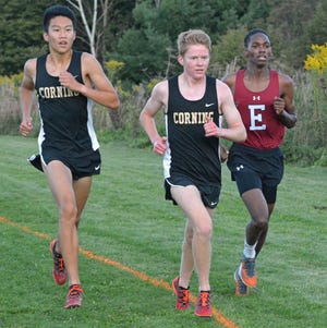 Corning's Matt Hong (left) and Torrey Jacobson-Evans (center) finished 1-2 Tuesday at Murray Athletic Center. [TOM PASSMORE/THE LEADER]