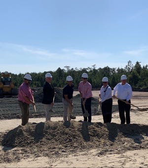 Noah Covington, Chairman, Rep. Ron Stephens, Giuliano Clo, Marcello Clo, Marcos Clo and David Camden break ground on CZM Foundation Equipment's new 40,000 square-foot factory and headquarters on Monday. The new facility will be located in the Interstate Centre II industrial park in Ellabell. [Submitted photo]