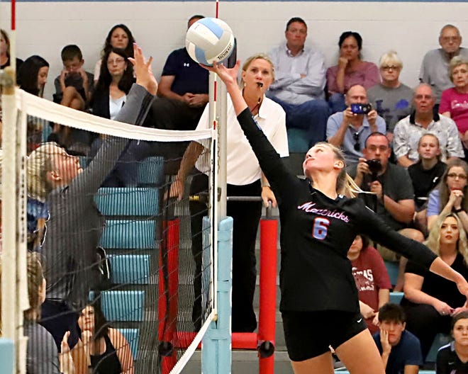 Greenwood's Camryn Presley, left, looks for the block at the net on Southside's Hannah Hogue on Sept. 3 during the second set at Southside High School in Fort Smith. [JAMIE MITCHELL/TIMES RECORD]