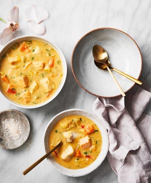 This saffron chowder from "The Beauty Chef Gut Guide" is made with salmon and a white fish called barramundi. [Contributed by Rochelle Eagle]