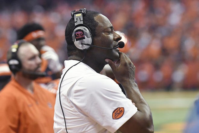 Syracuse coach Dino Babers watches a Clemson touchdown during the first half of an NCAA college football game on Sept. 14 in Syracuse. [STEVE JACOBS/ASSOCIATED PRESS]