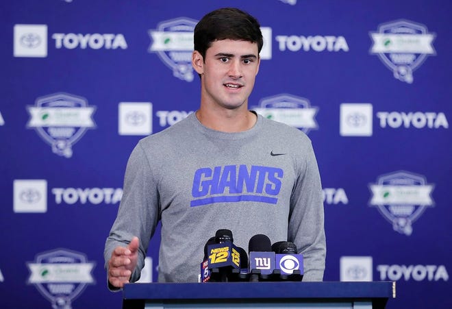 In this July 25 file photo, New York Giants' Daniel Jones responds to questions during a news conference at the NFL football team's training camp in East Rutherford, N.J. While not happy about losing his long-time starting job, Eli Manning knew there was a distinct possibility Giants coach Pat Shurmur would make Daniel Jones the New York quarterback if the team got off to a bad start. [FRANK FRANKLIN II/ASSOCIATED PRESS]