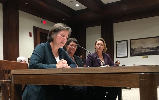 Sen. Jo Comerford, Rep. Mindy Domb, and Rep. Natalie Blais testified Tuesday in support of Comerford's bill to ban the use of public or campaign funds for payments involving a public official found guilty of sexual assault or harassment. [Photo: Katie Lannan/SHNS]
