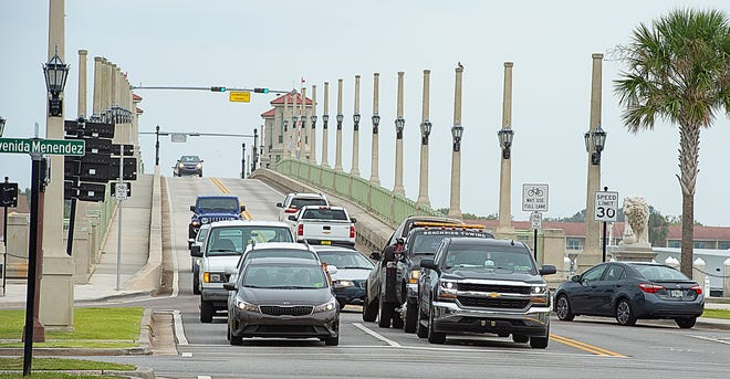 Vehicles wait at the traffic light on the west side of the Bridge of Lions to go straight or turn left on Wednesday. The city is looking at only allowing westbound traffic from the bridge to turn right. [PETER WILLOTT/THE RECORD]
