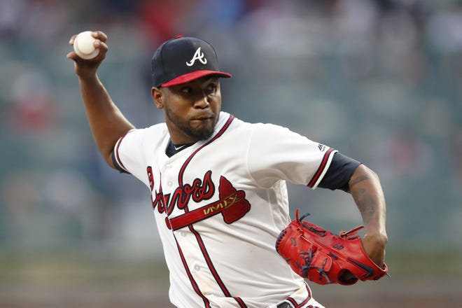 Atlanta pitcher Julio Teheran delivers in the first inning against the Philadelphia Phillies Wednesday in Atlanta. [John Bazemore/Associated Press]