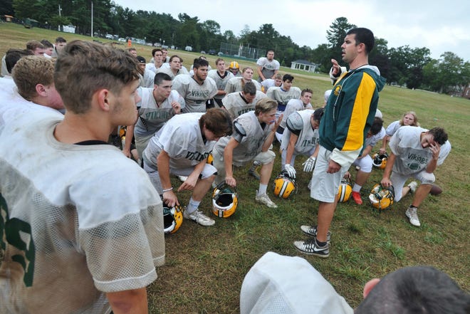 South Shore Tech's new head coach Matt Doyle instructs his team during football practice on Wednesday, Aug. 28, 2019. [Tom Gorman/For The Patriot Ledger]