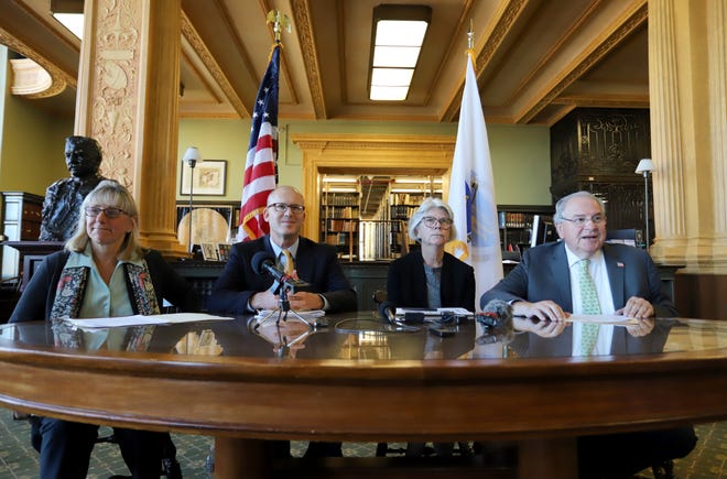 Senate President Karen Spilka, Education Committee Co-Chairs Sen. Jason Lewis and Rep. Alice Peisch, and House Speaker Robert DeLeo unveiled their education funding reform bill in the State Library on Thursday. [Photo: Sam Doran/SHNS]