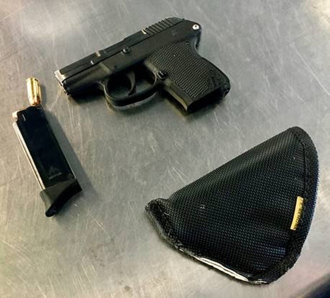 A gun with eight rounds was found in a Winchendon woman's carry-on bag Wednesday at Worcester Regional Airport, according to authorities. [Transportation Security Administration photo]