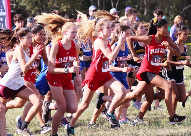 Members of the Glen Rose High School varsity girls cross country team get off to a good start Wednesday in the Glen Rose Invitational held at Dinosaur Valley State Park. The Lady Tigers placed fifth in the final team standings.