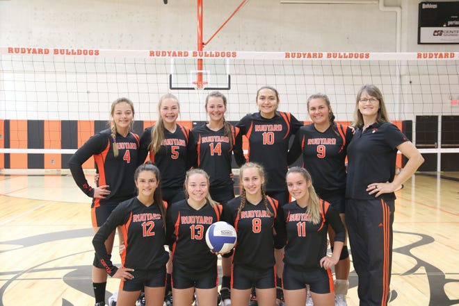 Rudyard is ranked No. 7 in this week's MIVCA Division 4 poll. The Bulldogs varsity team includes, front row, from left: Tori Tremblay, Chesney Molina, Tristin Smith, Jerzie Belleville; back row, from left: Paige Postma, Sara Beelen, Addie Kuenzer, Nina Alpers, Brooklyn Besteman, and coach Ellen Perry. Missing from photo: Morgan Bickel. [David Latva/St. Ignace News photo]