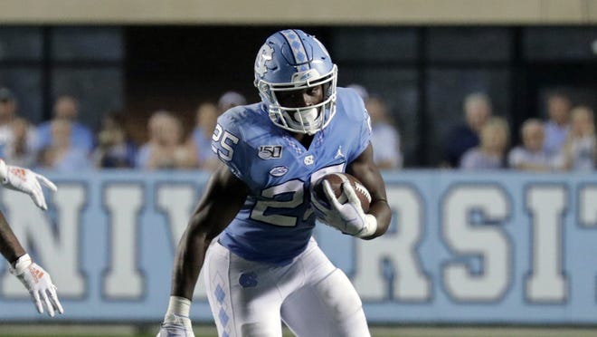 Javonte Williams leads the Tar Heels with 205 yards rushing this season. A strong performance from him against Applachian State would take some pressure off freshman quarterback Sam Howell. [AP Photo/Chris Seward]