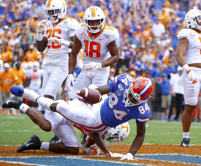 Florida Gators tight end Kyle Pitts (84) scores a touchdown after making a catch near the goal line during a game against Tennessee at Ben Hill Griffin Stadium in Gainesville, Fla. September 21, 2019. [Brad McClenny/The Gainesville Sun]