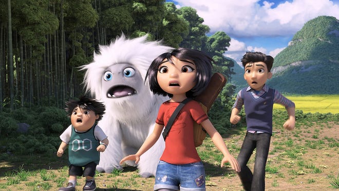 This image released by DreamWorks Animation shows characters, from left, Peng, voiced by Albert Tsai, Everest the Yeti, Yi, voiced by Chloe Bennet and Jin, voiced by Tenzing Norgay Trainor, in a scene from "Abominable," in theaters on Sept. 27. [DREAMWORKS ANIMATION LLC VIA ASSOCIATED PRESS]