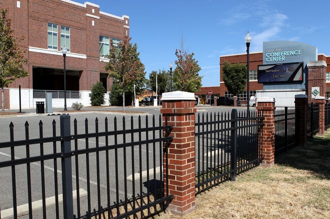 The city of Gastonia is considering selling the parking lot next to its downtown conference center to allow for construction of a 120-room hotel. [JOHN CLARK/THE GASTON GAZETTE]