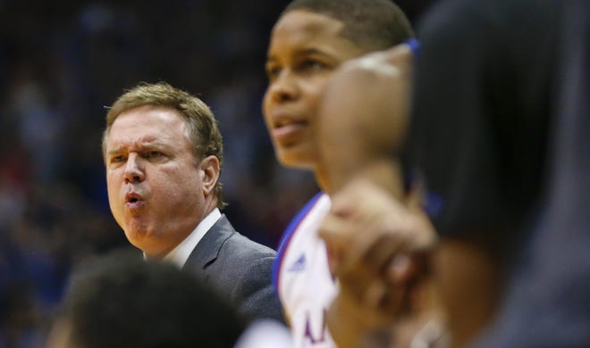 Kansas men's basketball coach Bill Self, left, has reportedly been hit by the NCAA with a charge of lack of institutional control in a notice of allegations delivered Monday, according to a report from Yahoo Sports. The allegations include three Level 1 violations against the men's basketball program and Level 2 violations against the football program. [File photograph/The Capital-Journal]