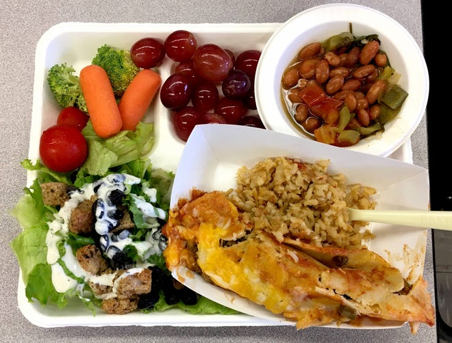 School lunches have been improving across the country, but particularly in school districts like Austin Independent School District, where food writer Addie Broyles recently had this lunch of beef enchiladas, pinto beans, brown rice and a black bean salad. [Addie Broyles/American-Statesman]