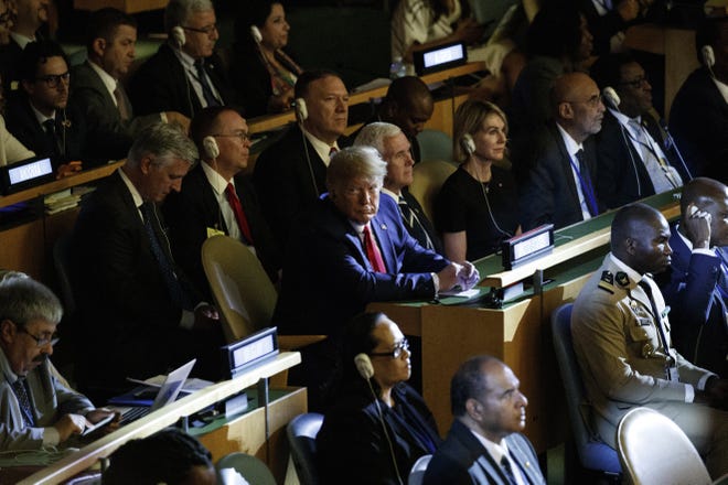 President Donald Trump listens during the the United Nations Climate Action Summit during the General Assembly, Monday in New York. [AP PHOTO/EVAN VUCCI]