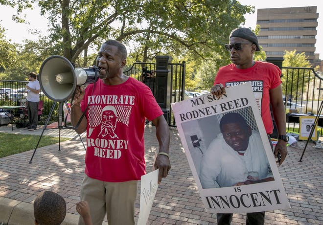 Rodrick Reed, left, with his brother Richard Reed, stands in front of the Governor's Mansion on Aug. 2, 2019, and pleads with Gov. Greg Abbott to stop the execution of their brother Rodney Reed which has been set for Nov. 20. About 15 supporters stood with Reed's family members to protest his execution for the strangulation murder of Stacey Stites, who was 19 when she was killed in 1996. [JAY JANNER/BASTROP ADVERTISER FILE]