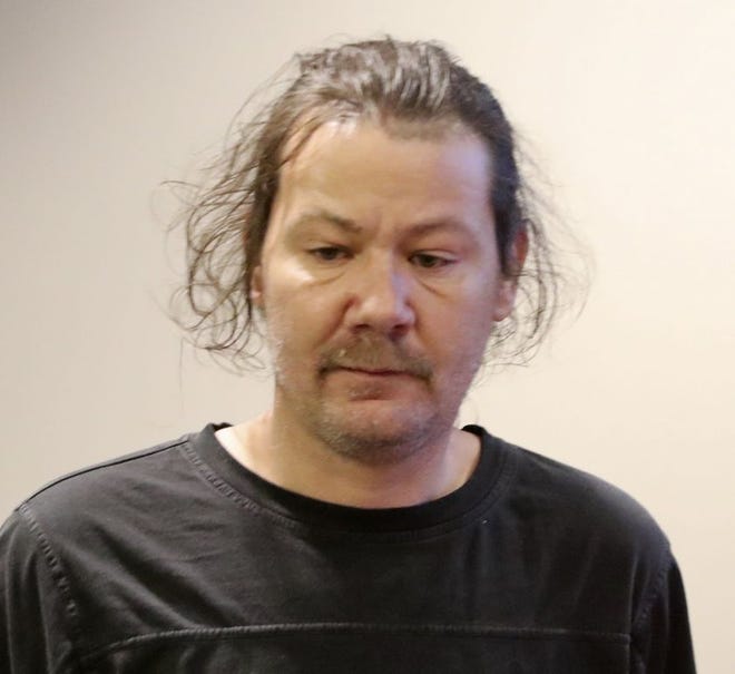 Barton Baldasare, 46, of Kent, appears Wednesday in Stow Municipal Court. Munroe Falls police say Baldasare's blood alcohol content was four times over the legal limit when he crashed into the back of a car last week near a middle school. [Karen Schiely/Akron Beacon Journal]