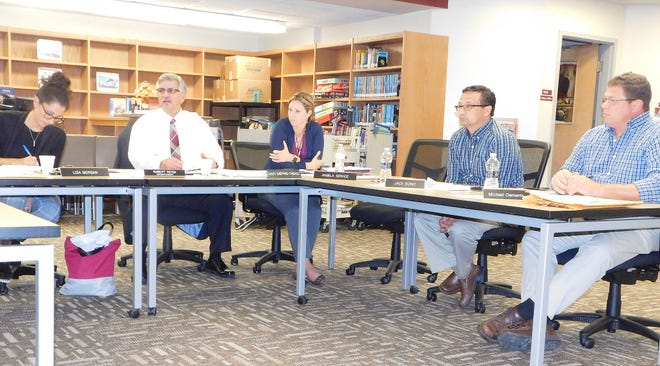 From left are Frankfort-Schuyler school board Clerk Connie Giordano, board President Lisa Morgan, school Superintendent Robert Reina, school Business Administrator Kacey Sheppard-Thibault and board members Jack Bono and Michael Clements during a meeting Tuesday. Also present were board members Cathy Sarafin and Joseph Ciccone. [DONNA THOMPSON/TIMES TELEGRAM]
