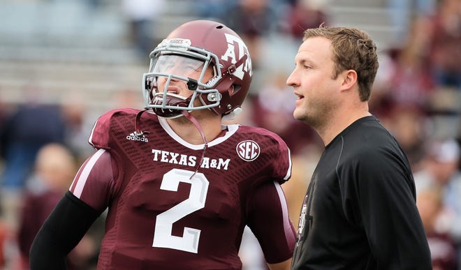 Then-Texas A&M assistant coach Jake Spavital, with Heisman Trophy winner Johnny Manziel in 2013, recruited running back Kendall Bussey to A&M. Bussey later transferred to Nicholls State, which will face Spavital's Bobcats on Saturday. [SCOTT HALLERAN/GETTY IMAGES FILE]