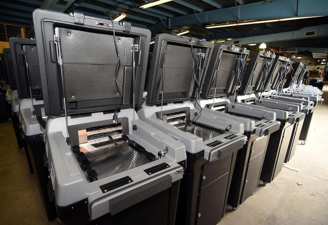 Beaver County's new voting machines include large scanners that will read paper ballots. [Lucy Schaly/For BCT]