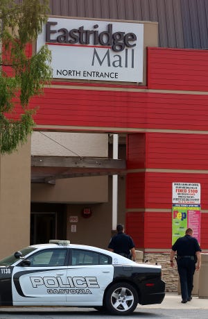 Gastonia police on the scene at Eastridge Mall on North New Hope Road Friday morning after it was noticed that the ATM had been stolen. [Mike Hensdill/The Gaston Gazette]