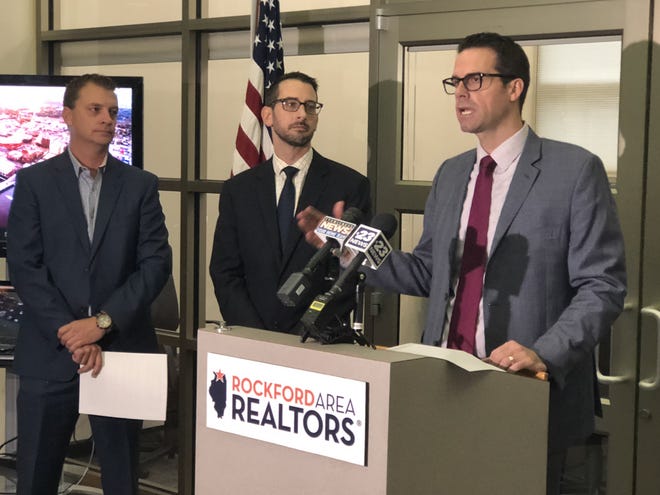 Rockford Area Realtors CEO Conor Brown discusses the state of the region's housing market during a press conference on Friday, Sept. 27, 2019. Looking on are Rockford Area Economic Development Council CEO Nathan Bryant, left, and Mayor Tom McNamara. [KEN DECOSTER/RRSTAR.COM STAFF]