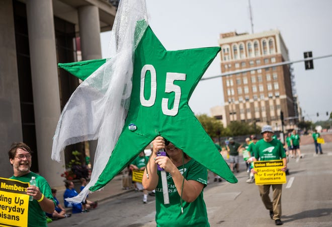 AFSCME, which signed a new contract with the state of Illinois after years of negotiations, will be the Grand Marshal for the 2019 Labor Day Parade in Springfield. The union said it believes past due step increases owed to its members should be paid by Sept. 30. [Justin L. Fowler/The State Journal-Register file photo]