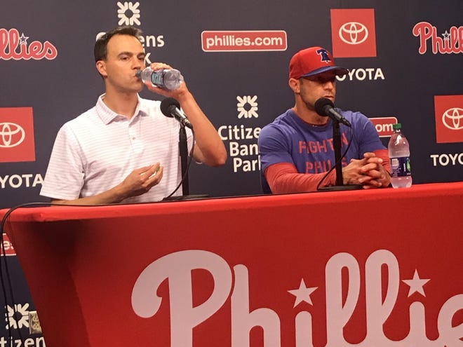 The Phillies' Matt Klentak and Gabe Kapler meet with the media after the hiring of Charlie Manuel as hitting coach in mid-August. [TOM MOORE / STAFF PHOTOJOURNALIST]
