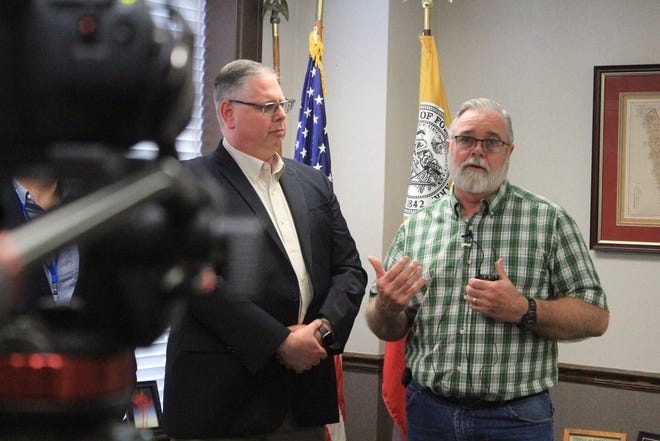 Jimmie Deer, right, speaks to the media after City Administrator Carl Geffken, left, named him director of the newly formed Building Services Department. Deer was previously the building official of Development Services, which has split into a separate department. [MAX BRYAN/TIMES RECORD]