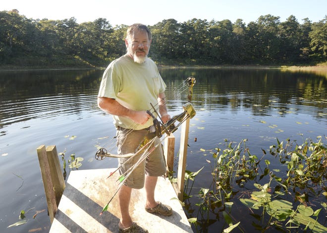 Gary Kaser, of Brewster, is asking the town to expand areas that allow bow hunting. “I live on the edge of the Punkhorn, which is closed to hunting, and I now have a big problem with the deer getting into my garden, plus all the ticks they carry,” he said.  [Ron Schloerb/Cape Cod Times]