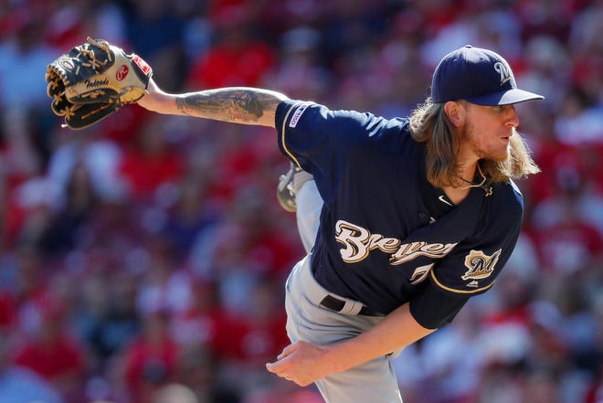 Milwaukee Brewers relief pitcher Josh Hader throws in the ninth inning of a baseball game against the Cincinnati Reds, Thursday, Sept. 26, 2019, in Cincinnati. (AP Photo/John Minchillo)