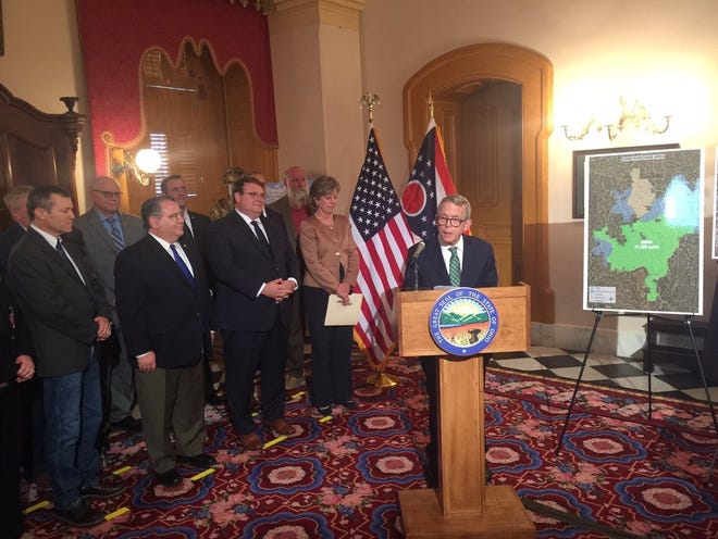 Ohio Gov. Mike DeWine announces the purchase of more than 31,000 acres of land in eastern Ohio from AEP on Wednesday, Oct. 2, 2019. [Beth Burger/Columbus Dispatch]