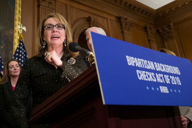 FILE - In this Jan. 8, 2019, file photo, former Rep. Gabby Giffords, speaks during a news conference to announce the introduction of bipartisan legislation to expand background checks for sales and transfers of firearms, on Capitol Hill in Washington. Ten White House hopefuls will participate Wednesday in an all-day forum on gun policy hosted by MSNBC, March for Our Lives and Giffords. March for Our Lives is the student-led gun control movement sparked by the high school shooting in Parkland, Florida, last year, and Giffords is the advocacy organization set up by former Arizona congresswoman Gabby Giffords, who was shot in the head during a constituent meeting in 2011. (AP Photo/Alex Brandon, File)