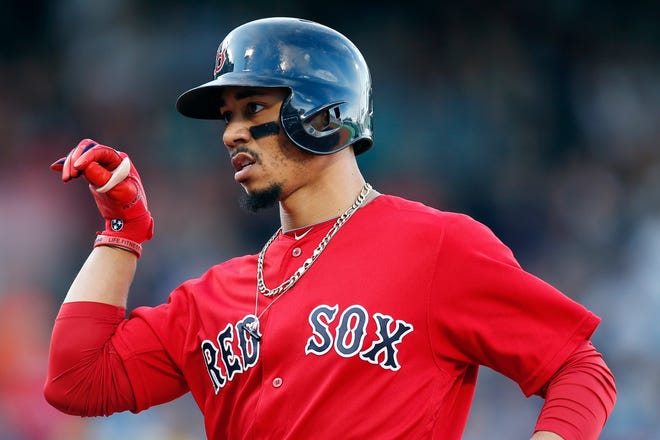 With the Red Sox faced with cutting costs, all-star Mookie Betts could be as good as gone. [File Photo/The Associated Press]