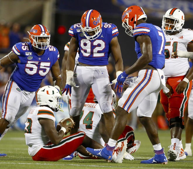 Florida defensive lineman Jabari Zuniga (92) is expected back in the lineup Saturday against Auburn. [PHOTO BY BRAD MCCLENNY/SPECIAL TO THE GUARDIAN]
