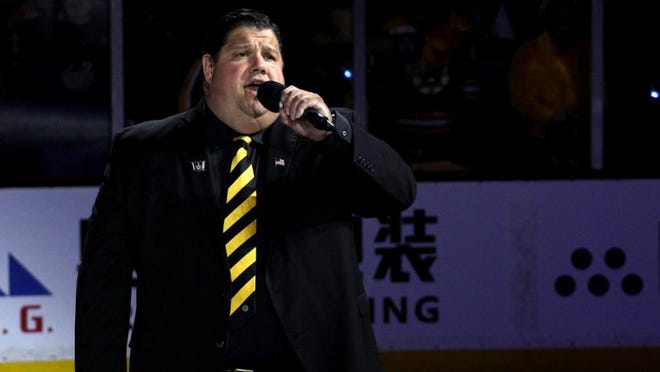 Todd Angilly sings "The Star Spangled Banner" before a Bruins game. [Bruins photo]