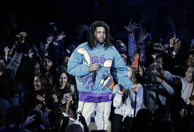 Fayetteville-raised rapper J. Cole performed at halftime during the NBA All-Star game earlier this year in Charlotte. [AP Photo/Gerry Broome]