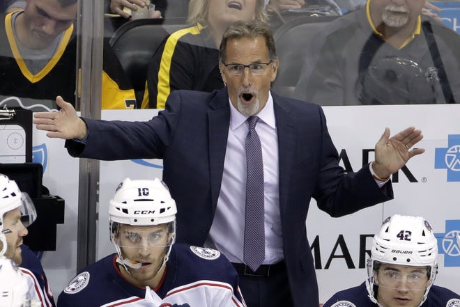 Blue Jackets coach John Tortorella objects to a call during the first period against the Penguins on Saturday night. [Gene J. Puskar/The Associated Press]