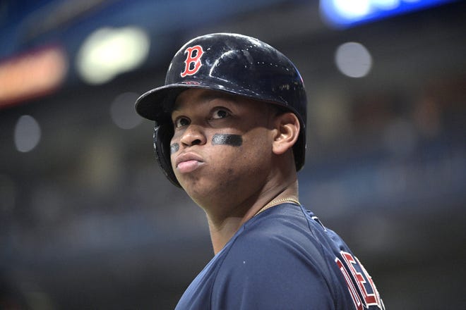 Trading away Rafael Devers, packaged with David Price, could help Boston restock its farm system and help the team keep Mookie Betts. [AP / Phelan M. Ebenhack]