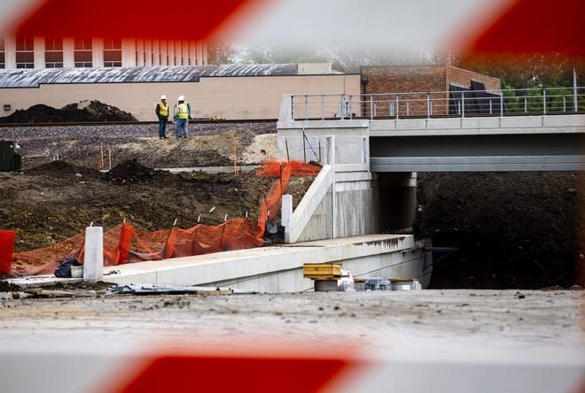 In this May 2019 file photo, construction of one of the two new bridges for the rail lines is completed for the Ash Street underpass project for the rail crossing improvement project to combine local train traffic onto the 10th Street corridor. Ash Street is expected to reopen within the next month. [The State Journal-Register file photo]