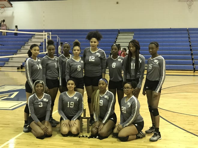 The Woodville-Tompkins volleyball team after beating Toombs County to win an Area title on Saturday. [WOODVILLE-TOMPKINS]