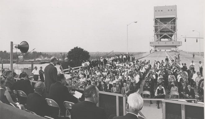 More than 500 local and state officials, as well as residents and servicemen and women, attend the dedication of the Cape Fear Memorial Bridge in October 1969. The bridge was dedicated to the men and women of North Carolina who died during World War II. [PHOTO COURTESY OF THE NEW HANOVER COUNTY LIBRARY]