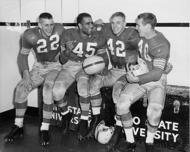 Ohio State 1954 football players, from left, Dave Leggett, Bobby Watkins, Hubert Bobo and Howard "Hopalong" Cassady [File photo]