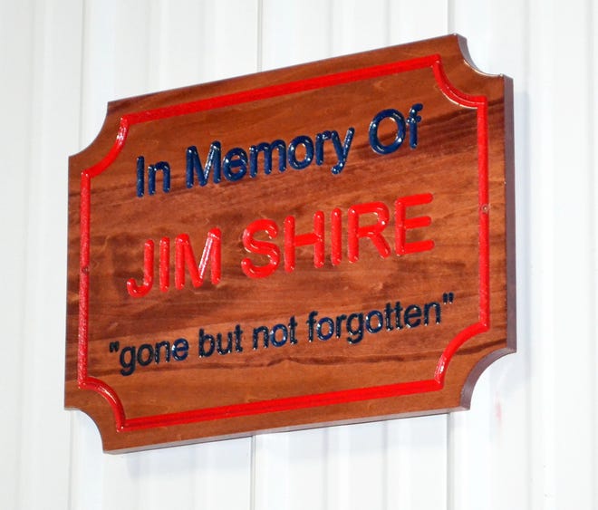 A plaque honors Jim Shire, former manager of the Habitat for Humanity Re-Store.