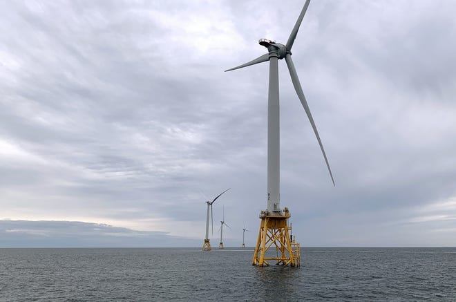 Deepwater Wind's turbines stand in the water off Block Island, R.I. on Friday, Aug. 23, 2019. [ RODRIQUE NGOWI/AP FILE PHOTO ]
