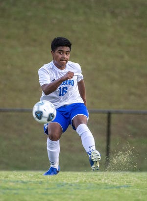 Asheboro's Marvin Villavicencio sends the ball down field against Randleman at Charles R. Gregory stadium at Randleman High School Monday. [PJ WARD-BROWN/SPECIAL TO THE COURIER-TRIBUNE]